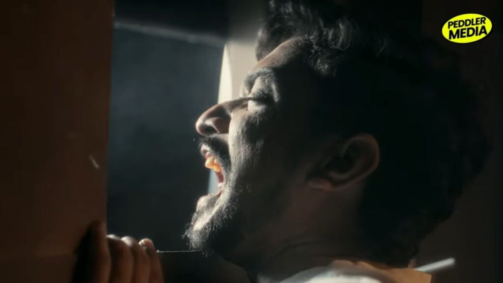 Close-up struggle moment symbolizing pain and control in Timelapse by Ron Likhari