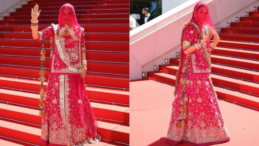 Ruchi Gujjar wearing pink Rajasthani ghunghat AT Cannes 2026 red carpet staircase