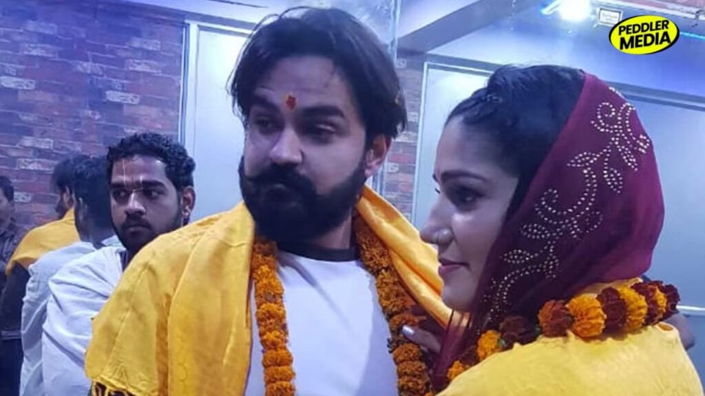 Sapna Choudhary and Veer Sahu wedding photo with garlands
