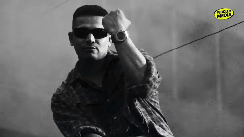 Dhanda Nyoliwala in a black and white close up shot from Kath Lagda music video