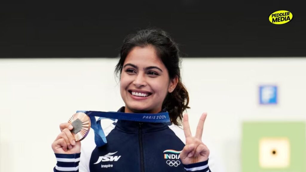 Manu Bhaker from Jhajjar Haryana holding Paris 2024 Olympic bronze medal — first Indian to win two medals at one Olympics