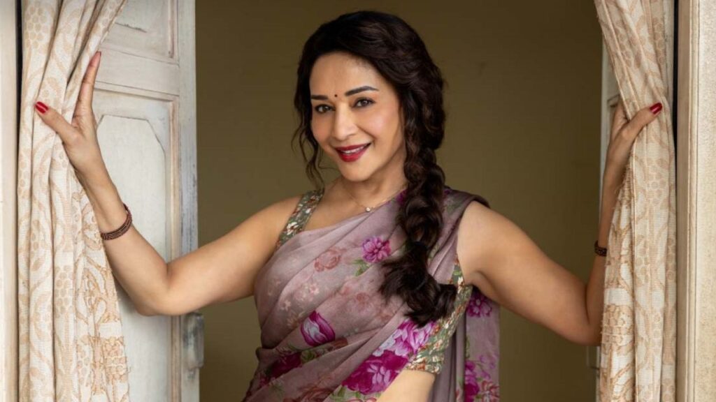 Madhuri Dixit in floral saree as her character in Maa Behen