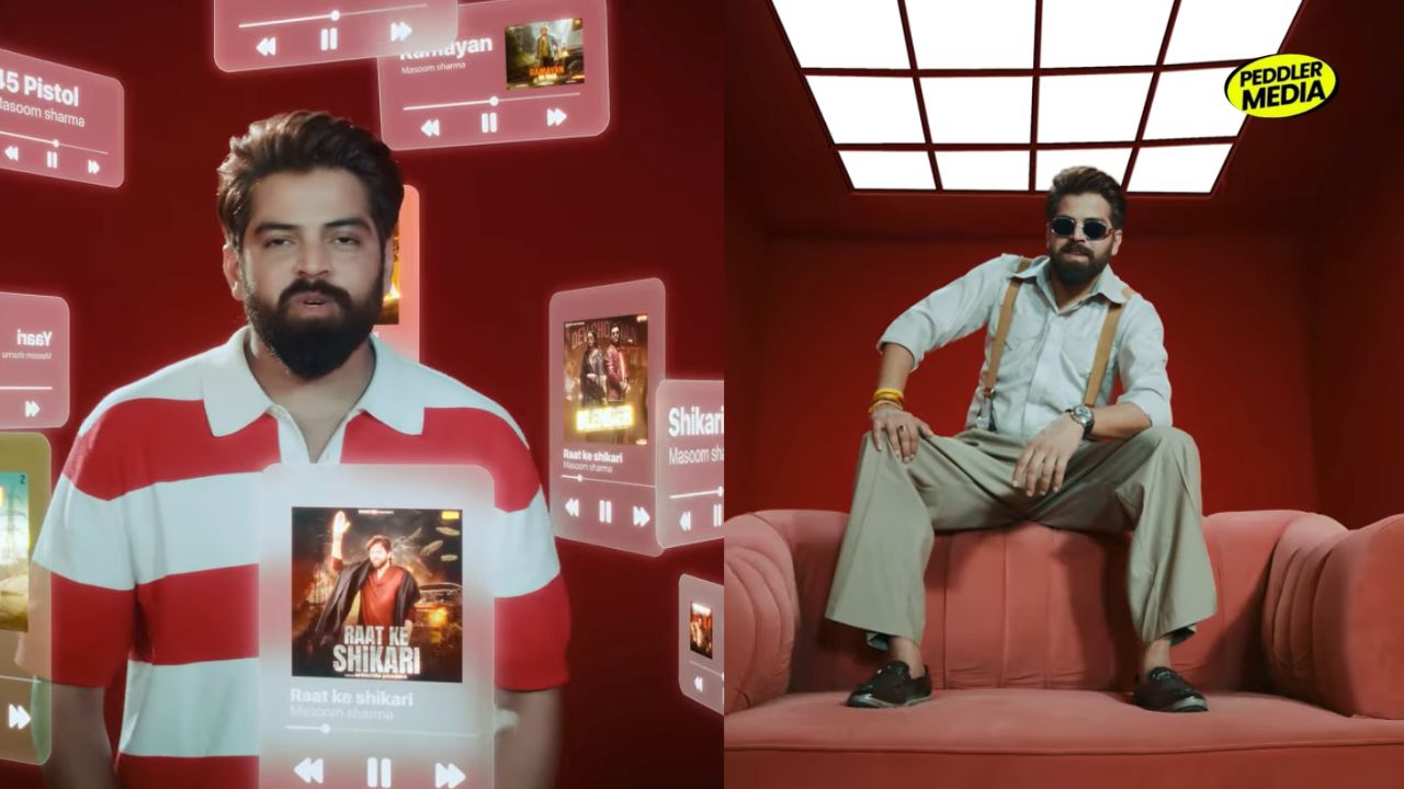 Masoom Sharma sitting confidently in red room wearing suspenders and sunglasses