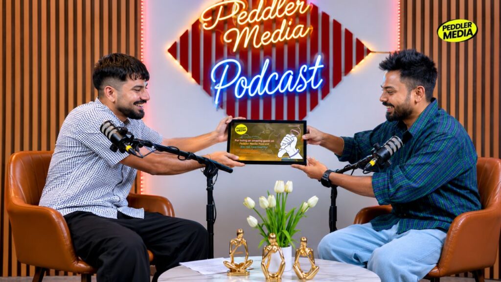 Sargana Haryanvi rapper receiving Peddler Media momento on podcast