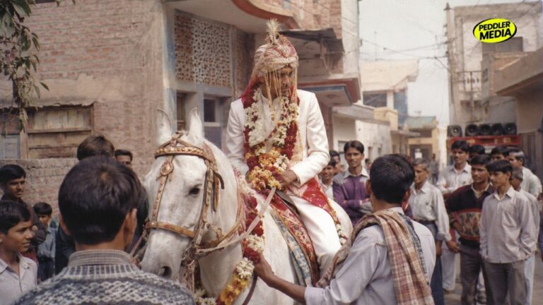 Haryanvi Wedding Rituals groom riding a decorated horse during Ghudchadi wedding procession