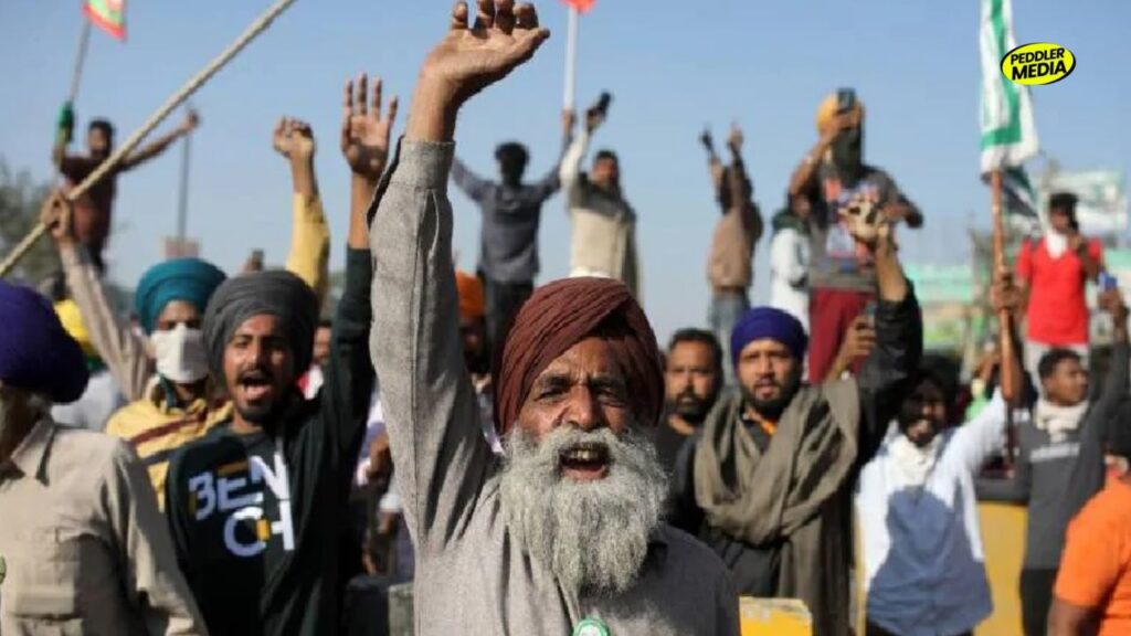 Farmers raise slogans during the 2020–21 farmers' protest in India, a movement referenced while discussing the 3 Major Protests and government accountability.