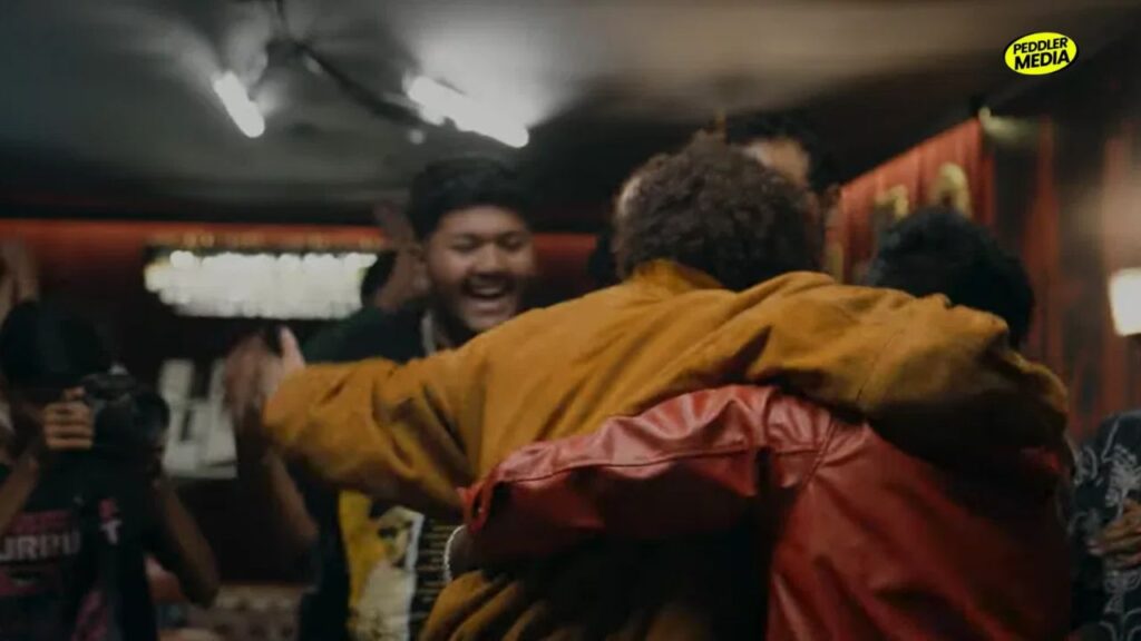 A contestant celebrates backstage after earning the Legacy card on Legacy Episode 1