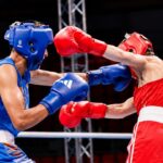 A symbolic visual of a boxing match representing the legacy of Haryana boxer Mehtab Singh.
