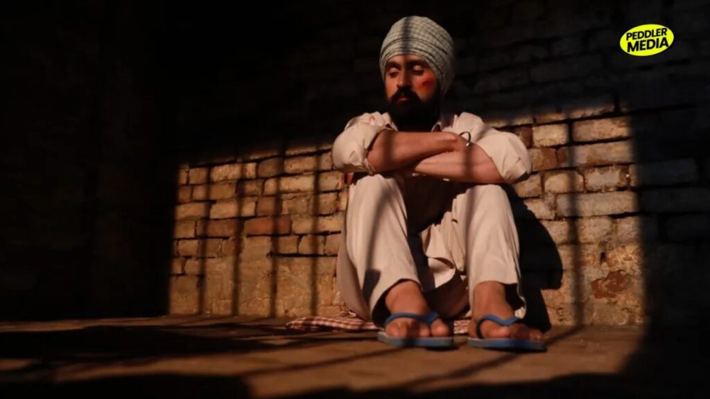 Diljit Dosanjh in a jail cell scene from Satluj movie