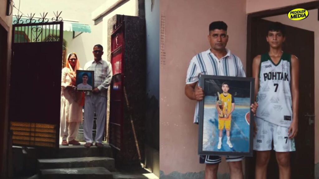 Families holding framed photos of young athletes featured in The Sports Files of Haryana
