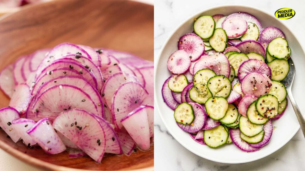  Sliced purple and pink Japanese radish with black sesame seeds on a wooden plate.