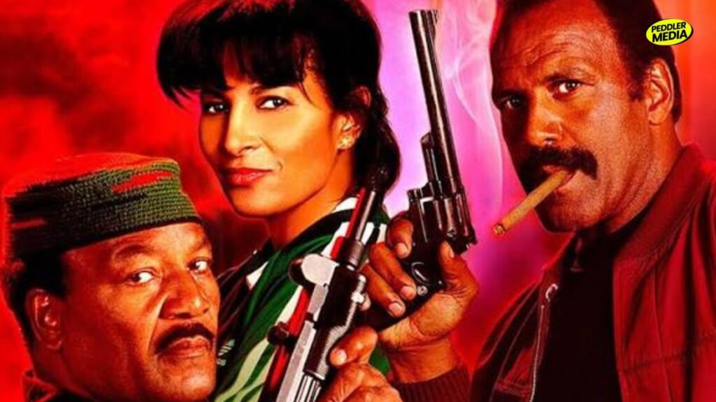 Fred Williamson Pam Grier and Jim Brown holding weapons in the 1996 movie Original Gangstas