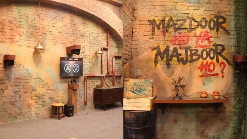 Inside view of the dark basement set in Rise and Fall Season 2 with a wall graffiti reading Mazdoor Ho Ya Majboor Ho.