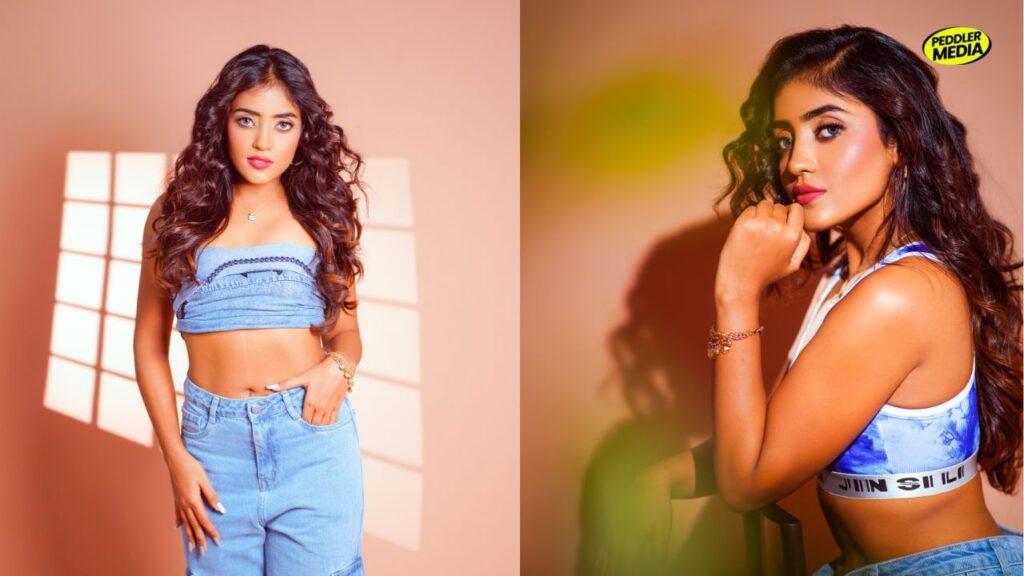 Actress Tanya Mishra posing in a casual blue denim crop top and jeans look.