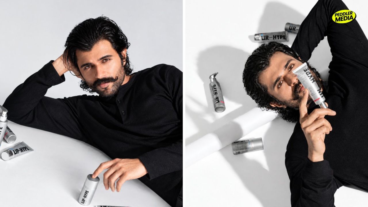 Vijay Deverakonda poses with Unhype skincare products