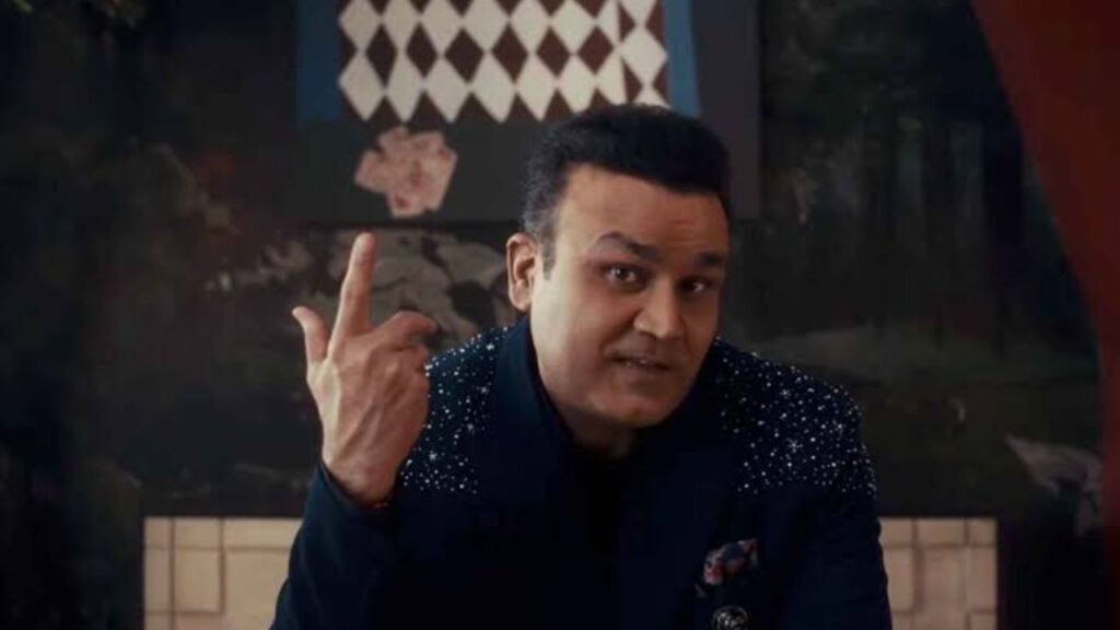 Close-up shot of host Virender Sehwag pointing his finger in an episode of Rise and Fall Season 2.