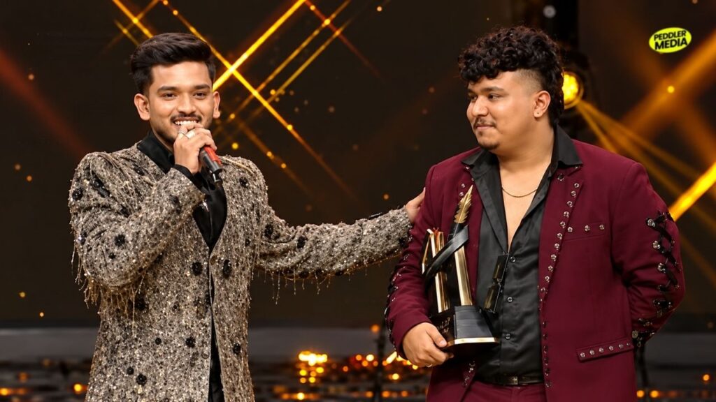 Dhadkan Haryanvi Rapper standing with his squad boss Paradox on the MTV Hustle 5 stage after winning the show
