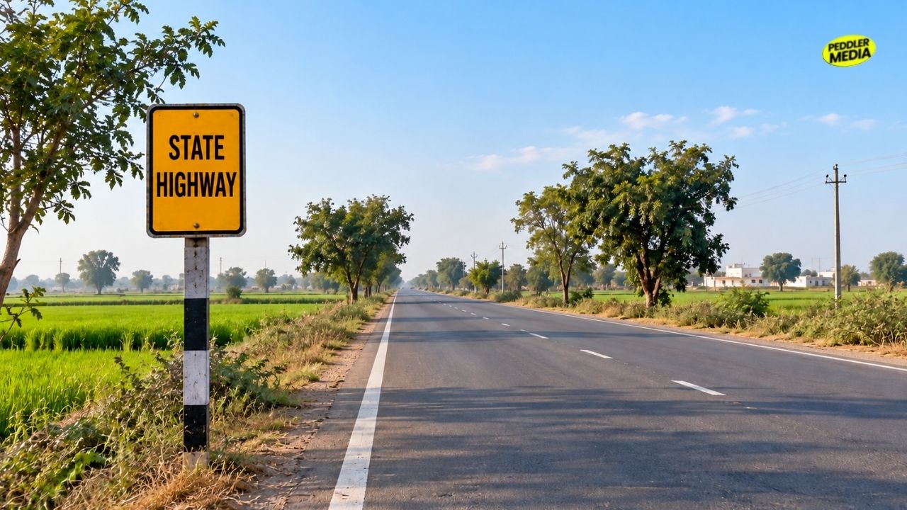 A scenic view of a clean rural state highway road with a yellow signboard to explore Haryana through fields.