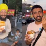 Panchkula vendor serving the Most Unique Pineapple Burger Of India at Tashan cart while food vlogger tries it.